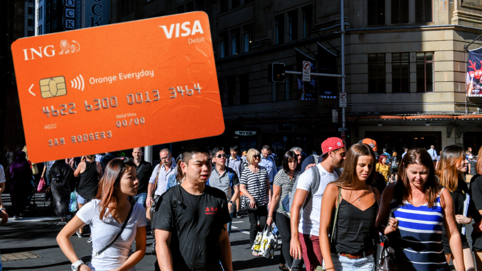 A composite image of people walking on the street and the ING everyday card.