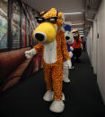 <p>Chester the Cheetah leads a parade of company mascots brought in as interns for the day at Yahoo Studios in New York City on Sept. 25, 2017. (Photo: Gordon Donovan/Yahoo News) </p>