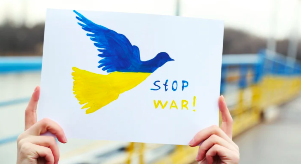 Print with a bird on it that says, "Stop war!"