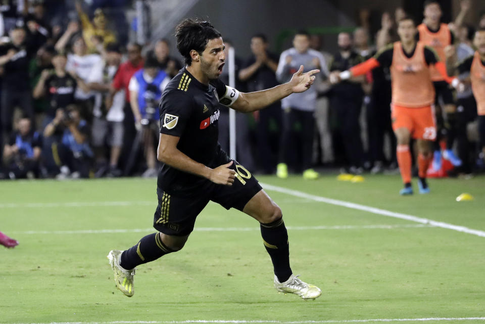 Los Angeles FC's Carlos Vela (10) celebrates after scoring against the Los Angeles Galaxy during the second half of an MLS soccer match Sunday, Aug. 25, 2019, in Los Angeles. (AP Photo/Marcio Jose Sanchez)