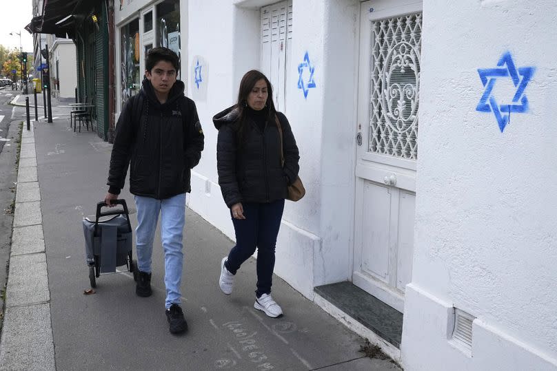 Stars of David tagged on a wall in Paris