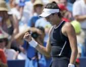 Aug 20, 2017; Mason, OH, USA; Garbine Muguruza pumps her first after match point in the second set of the womens finals match against Simona Halep during the Western & Southern Open at the Lindner Family Tennis Center. Mandatory Credit: Sam Greene/The Cincinnati Enquirer via USA TODAY NETWORK