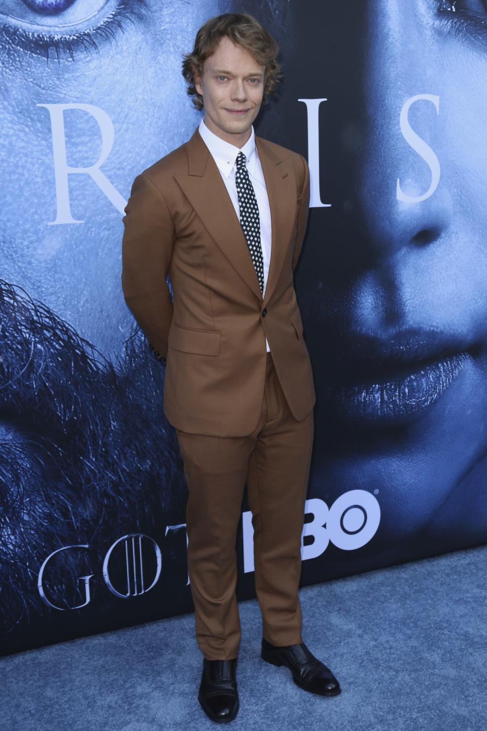 <p>Lily Allen’s brother — otherwise known as Theon Greyjoy to the GOT community — wore a brown two-piece suit. (Photo: AP) </p>