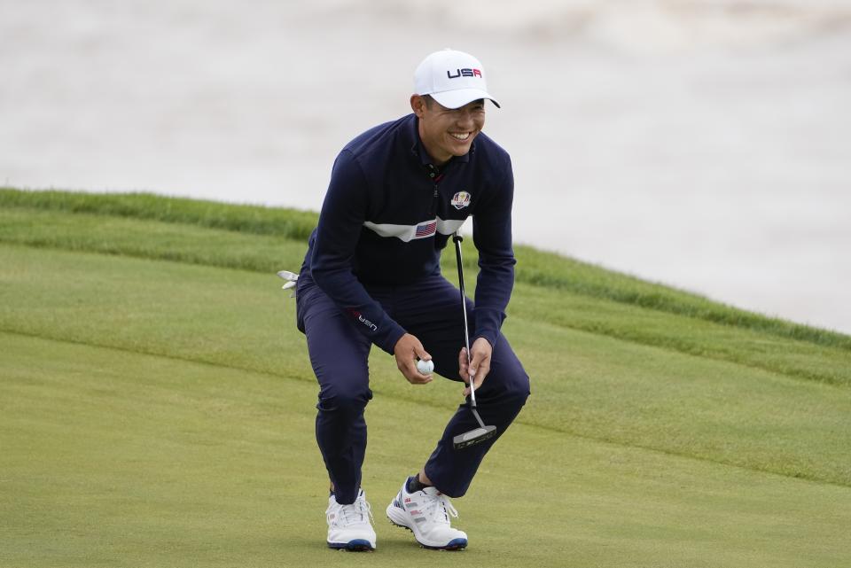 Team USA's Collin Morikawa smiles on the third hole during a practice day at the Ryder Cup at the Whistling Straits Golf Course Thursday, Sept. 23, 2021, in Sheboygan, Wis. (AP Photo/Jeff Roberson)