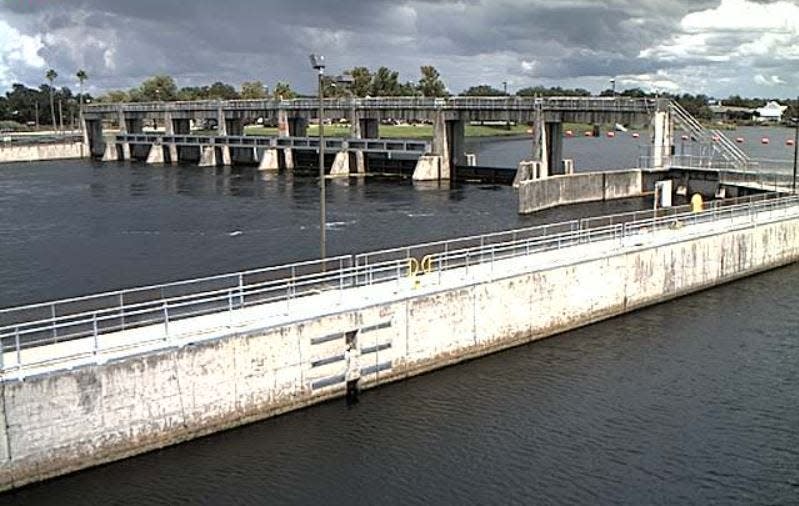 Water flows through the Franklin Lock and Dam on the Caloosahatchee River toward the river's estuary at 2 p.m. Friday, Sept. 18, 2020, as shown by the Army Corps of Engineers spillway camera.