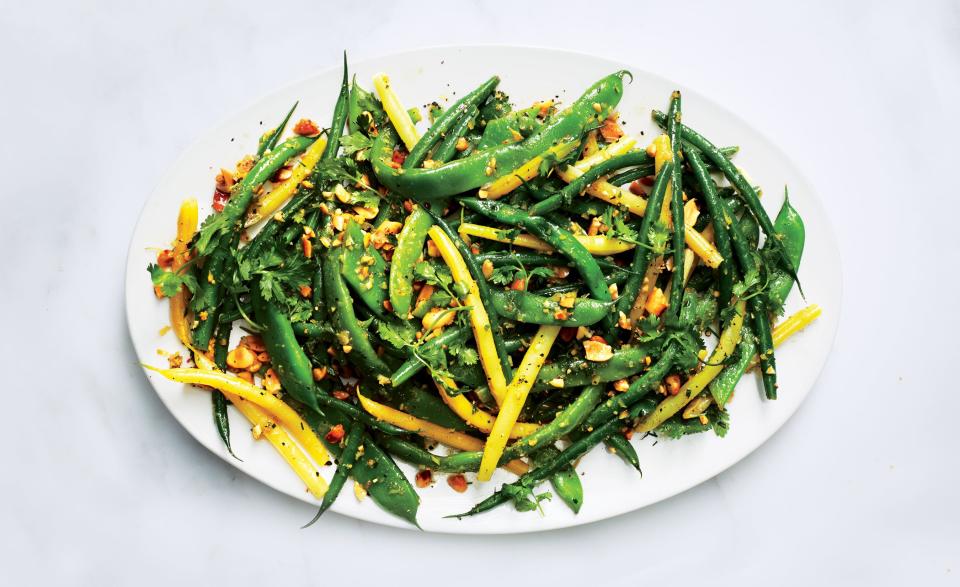 Bright and lively, grated ginger rubs elbows with fresh snap beans and splashes of lime juice to capture high summer at its best in this vegetarian side dish. If he ever tried it, Bryan Adams would write a song about it. <a rel="nofollow noopener" href="https://www.bonappetit.com/recipe/mixed-beans-with-peanuts-ginger-and-lime?mbid=synd_yahoo_rss" target="_blank" data-ylk="slk:See recipe.;elm:context_link;itc:0;sec:content-canvas" class="link ">See recipe.</a>