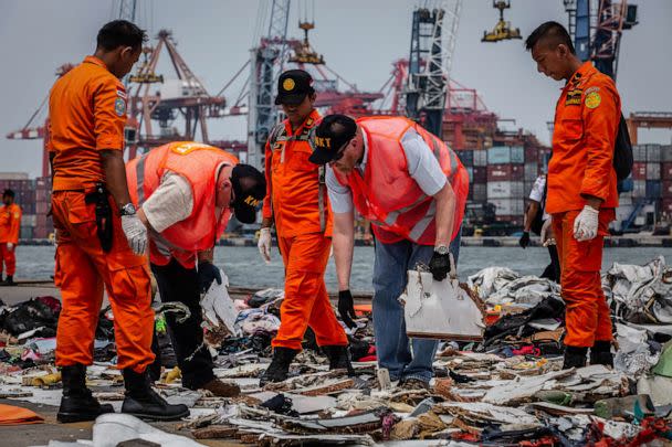 PHOTO: National Transportation Safety Board (NTSB), Boeing and Search and Rescue personnel check debris from Lion Air flight JT 610 at the Tanjung Priok port, Nov. 1, 2018, in Jakarta, Indonesia. (Ulet Ifansasti/Getty Images)