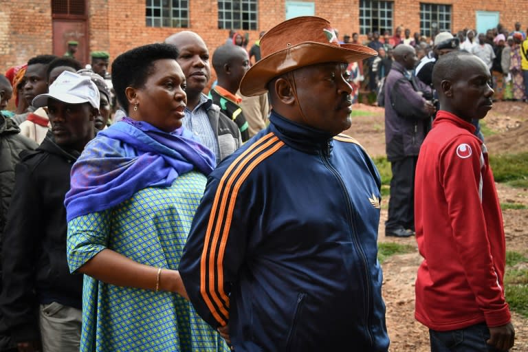 President Pierre Nkurunziza -- seen waiting to vote with wife Denise -- obtained the vote he wanted to extend his grip on power which he could now hold on to until 2034