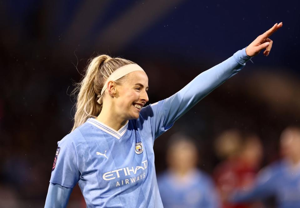 Kelly celebrates scoring for Man City against Liverpool (Getty)