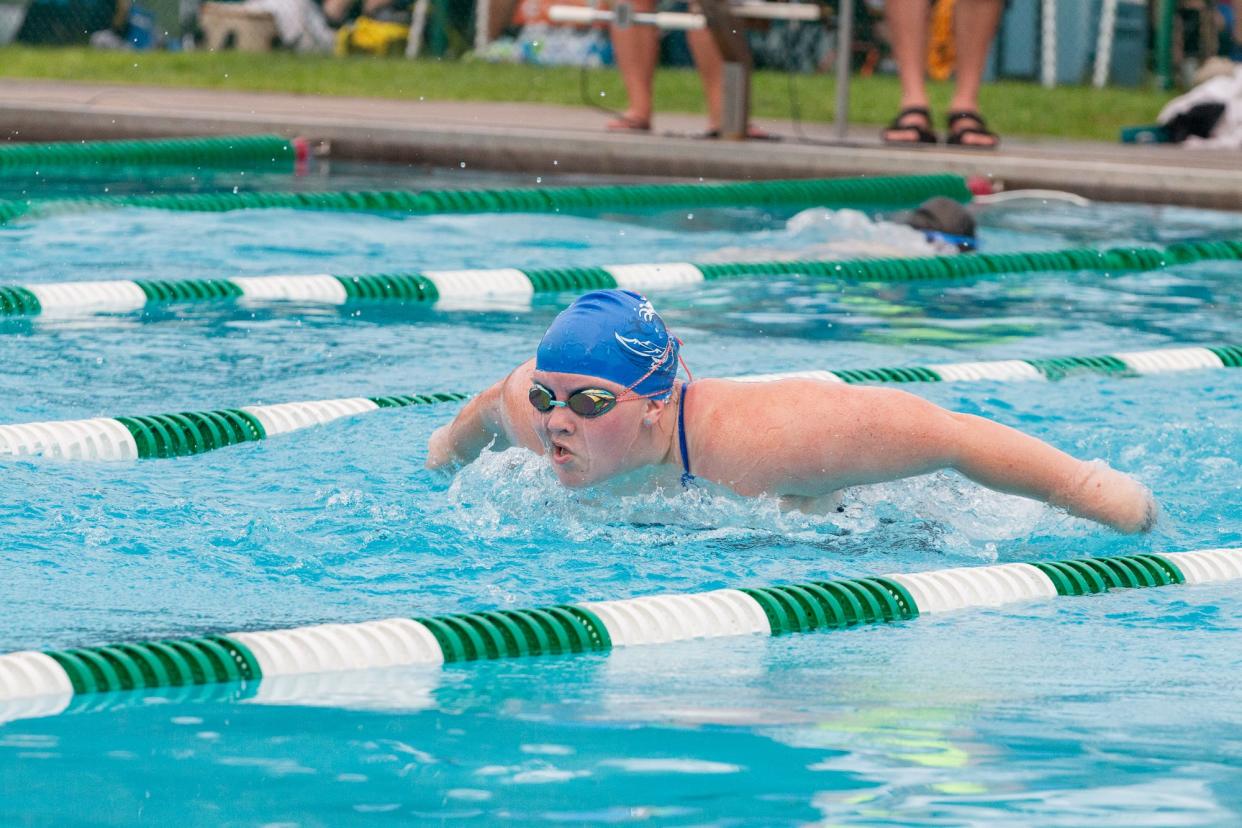 Aubree Gallant competes in the 50-meter butterfly at the OMSSL championships at Greenhills, Ohio