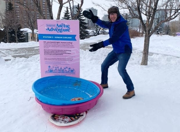 Bridgeland's Arctic Adventure Experience has participants try 'human curling,' which involves sliding down a hill in a kiddie pool into a painted bullseye.