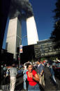 Jennifer S. Altman, a freelance photographer, took this picture of the towers ablaze, and far, far below them, one woman wearing an expression of pure horror. Five years later, Altman was invited to the home of the woman in red, Rose Parascandola, who had been working at an online-trading company on the 51st floor of WTC 1 on September 11. "She said that I really captured how she felt. She had seen it in the paper, and that it meant a lot to her." For Altman, it was a meaningful photo, as well. "It was a turning point in my career. All my skills came together at once in a professional way. But it also made me very aware of my life; I don't take things for granted." <br><br>(Photo: Jennifer S. Altman/WireImage)<br><br>For the full photo collection, go to <a href="http://www.life.com/gallery/59971/911-the-25-most-powerful-photos#index/0" rel="nofollow noopener" target="_blank" data-ylk="slk:LIFE.com;elm:context_link;itc:0;sec:content-canvas" class="link ">LIFE.com</a>