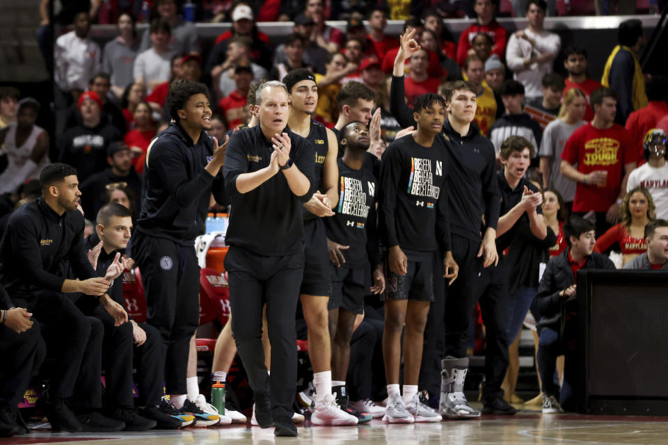 Northwestern Chris Collins reacts during the second half of an NCAA college basketball game against Maryland, Sunday, Feb. 26, 2023, in College Park, Md. Maryland won 75-59. (AP Photo/Julia Nikhinson)