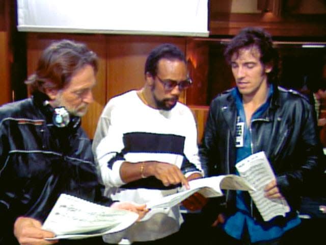 (From left): Willie Nelson, Quincy Jones and Bruce Springsteen discuss the vocal parts in "We Are the World."