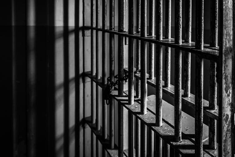 <span class="caption">The risk of ending up on the wrong side of the law stifles innovation.</span> <span class="attribution"><a class="link " href="https://www.shutterstock.com/image-photo/crime-prison-cell-bars-724345753?src=WsRji3nzw09-PFfYLyh28Q-1-3" rel="nofollow noopener" target="_blank" data-ylk="slk:shutterstock.com;elm:context_link;itc:0;sec:content-canvas">shutterstock.com</a></span>