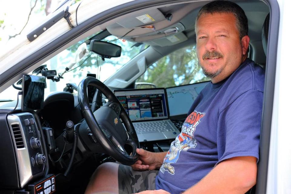 Mike Boylan of Mike’s Weather Page sits in his storm chasing truck on June 8, 2023. Boylan is prepping for tracking and chasing storms this hurricane season. Ryan Ballogg/rballogg@bradenton.com