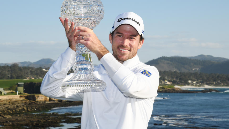 Nick Taylor, pictured here posing with the trophy after winning the AT&T Pebble Beach Pro-Am.