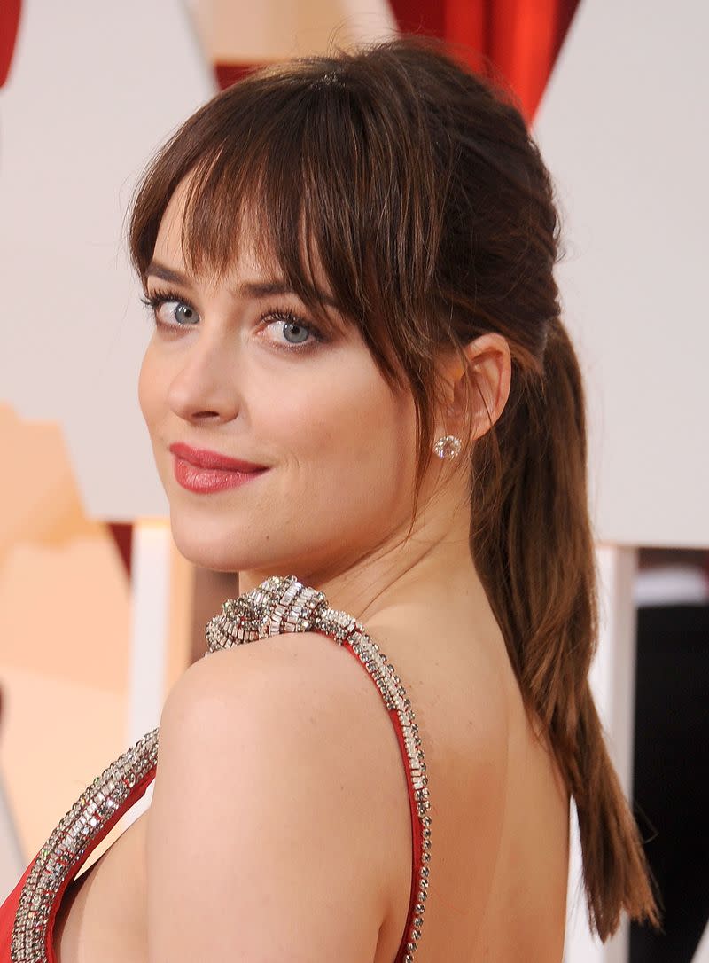<p> A simplistic way to ramp up your ponytail: brush it back and gently feather your bangs out like Johnson's. </p>