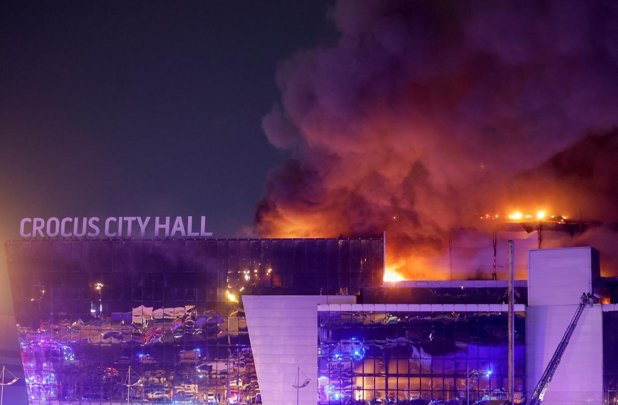 Smoke rises above the burning Crocus City Hall concert venue (REUTERS)
