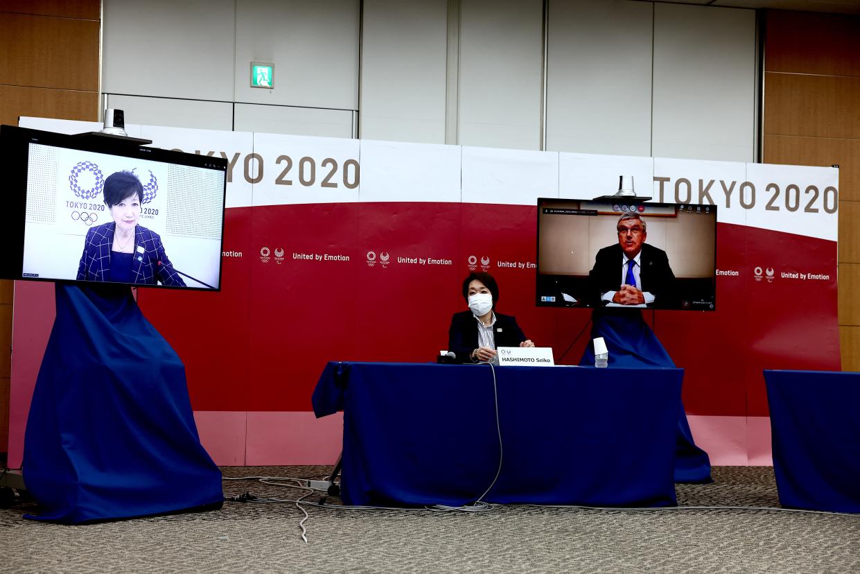 (L-R) Tokyo governor Yuriko Koike, Tokyo 2020 president Seiko Hashimoto and International Olympic Committee (IOC) president Thomas Bach attend the five-party meeting in Tokyo on July 8, 2021. (Photo by Behrouz MEHRI / POOL / AFP) (Photo by BEHROUZ MEHRI/POOL/AFP via Getty Images)