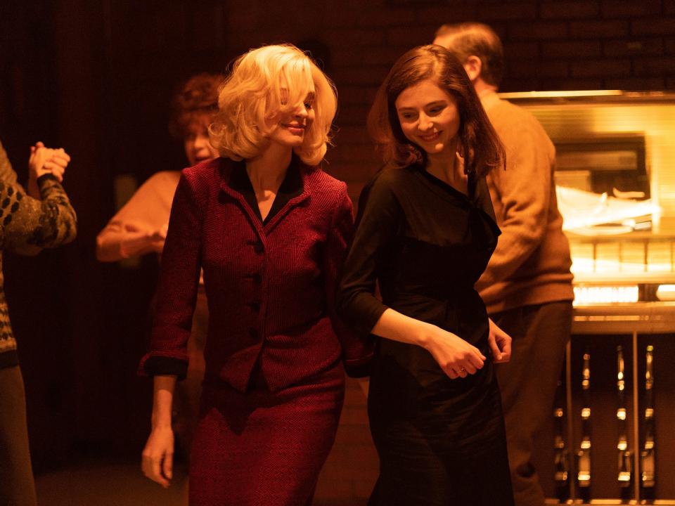 Anne Hathaway and Thomasin McKenzie in "Eileen."