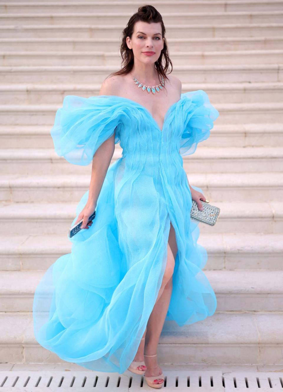 Milla Jovovich poses during the amfAR Cannes Gala 2022