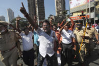 Activists shout slogans as police detain them during a protest against new farm laws in Mumbai, India, Wednesday, Jan. 27, 2021. Leaders of a protest movement sought Wednesday to distance themselves from a day of violence when thousands of farmers stormed India's historic Red Fort, the most dramatic moment in two months of demonstrations that have grown into a major challenge of Prime Minister Narendra Modi’s government. (AP Photo/Rafiq Maqbool)