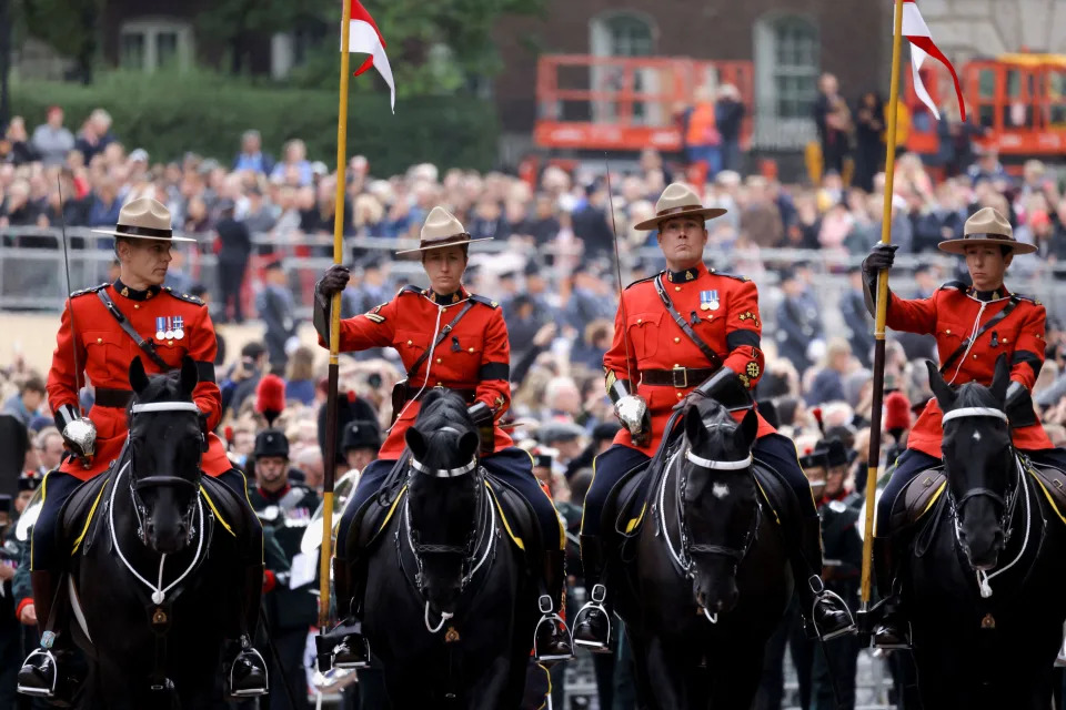 Royal Canadian Mounted Police led the procession during the state funeral of Queen Elizabeth II at Westminster Abbey on Sept. 19, 2022 in London, England. (Photo by Marko Djurica - WPA Pool/Getty Images)