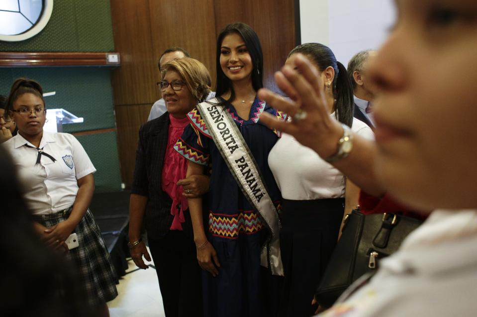 In this Oct. 10, 2018 photo, Miss Panama Rosa Iveth Montezuma poses for a photograph after speaking to high school students at the Panamanian Chamber of Commerce, Industries and Agriculture headquarters in Panama City. Montezuma is the first indigenous woman to win the Miss Panama beauty pageant. (AP Photo/Arnulfo Franco)