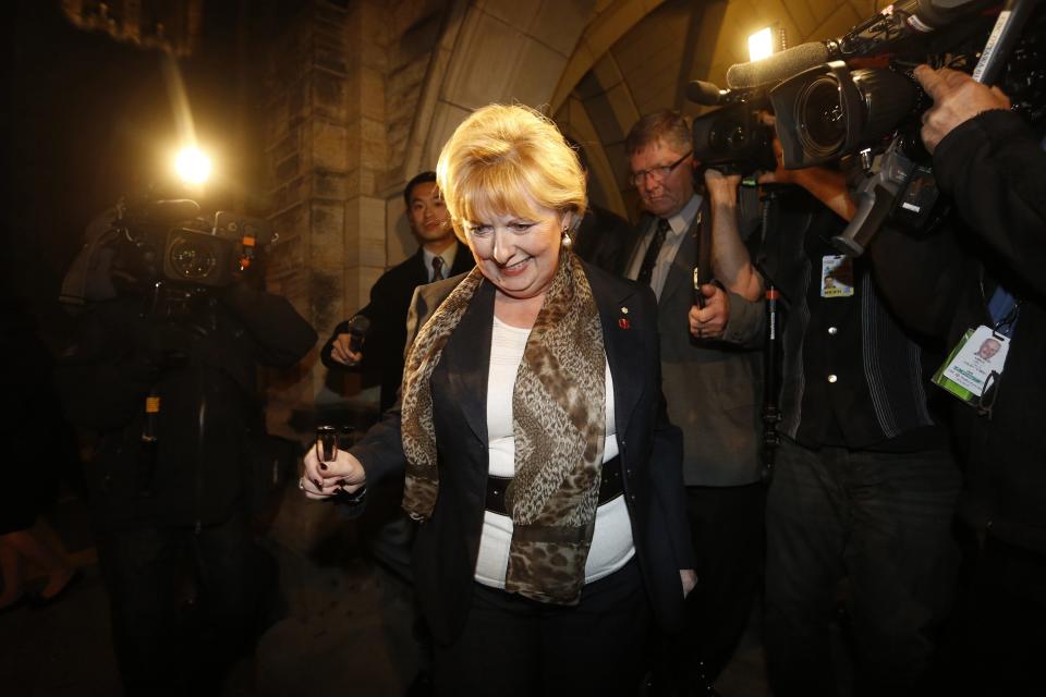 Senator Pamela Wallin leaves Parliament Hill in Ottawa October 23, 2013. The Senate is debating whether to suspend senators Wallin, Mike Duffy and Patrick Brazeau without pay. REUTERS/Chris Wattie (CANADA - Tags: POLITICS)