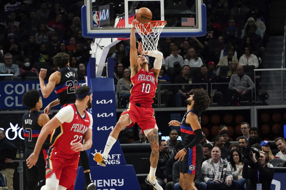 New Orleans Pelicans center Jaxson Hayes (10) is fouled by Detroit Pistons forward Kevin Knox II (20) in the first half of an NBA basketball game in Detroit, Friday, Jan. 13, 2023. (AP Photo/Paul Sancya)