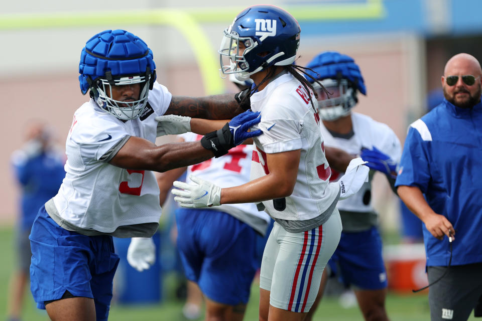 EAST RUTHERFORD, NJ - JULY 28: Linebacker Kayvon Thibodeaux #5 and safety Dane Belton #36 of the New York Giants in action during training camp at Quest Diagnostics Training Center on July 28, 2022 in East Rutherford, New Jersey. (Photo by Rich Schultz/Getty Images)