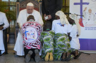 Pope Francis meets with victims of violence in eastern Congo, at the Apostolic Nunciature in Kinshasa, Democratic Republic of Congo, Wednesday, Feb. 1, 2023. Francis is in Congo and South Sudan for a six-day trip, hoping to bring comfort and encouragement to two countries that have been riven by poverty, conflicts and what he calls a "colonialist mentality" that has exploited Africa for centuries. (AP Photo/Gregorio Borgia)