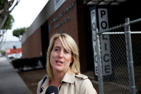 Attorney Mieke Ter Poorten speaks to the media about her client James Otis, the man who admits vandalizing Donald Trump's star on the Hollywood Walk of Fame, arrest outside of the LAPD Hollywood Station in Los Angeles, California October 27, 2016. Donald Trump's star on the Hollywood Walk of Fame was vandalized earlier this week. REUTERS/Patrick T. Fallon