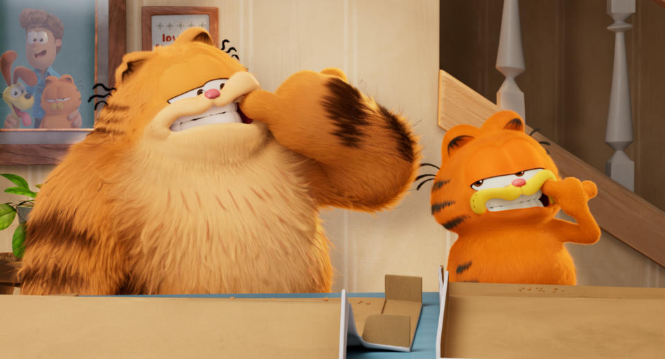 Garfield (voiced by Chris Pratt). and his dad (voiced by Samuel L. Jackson) in 'The Garfield Movie'