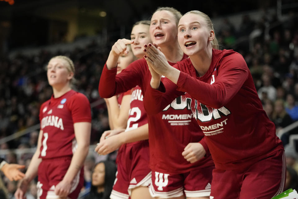 Indiana players react during the second half of a Sweet Sixteen round college basketball game against the South Carolina during the NCAA Tournament, Friday, March 29, 2024, in Albany, N.Y. (AP Photo/Mary Altaffer)