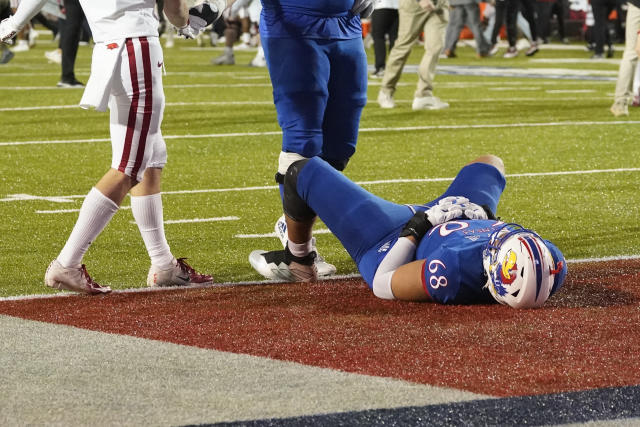 Kansas rallies, but Arkansas wins Liberty Bowl 55-53 in 3OTs