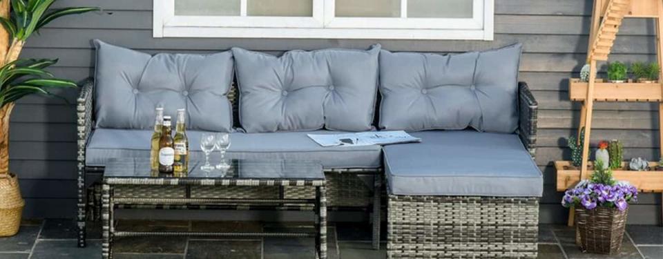 3 person section outdoor seating on patio in gray fabric