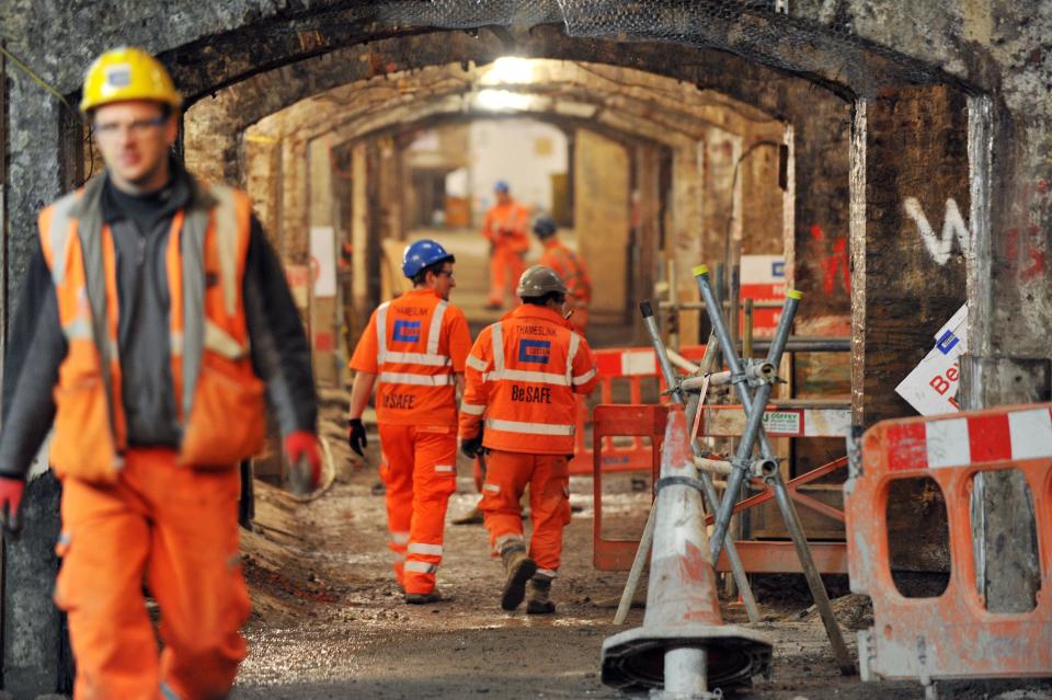 Construction workers in the Victorian arches underneath the tracks at London Bridge station, the capitals oldest station, as they undergo clearing and rebuilding as part of the &pound;6.5bn Thameslink Programme, making room for what will be the biggest station concourse in the UK.