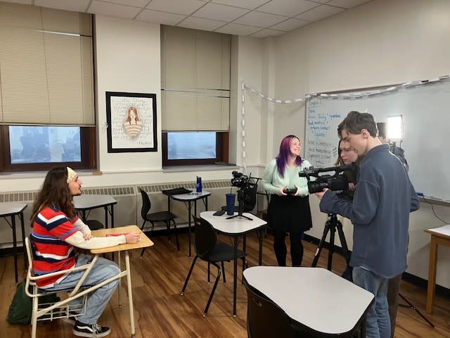 Music video star Hal Sprague (left, a Central sophomore) waits for the shot to be set up Jan. 25, 2024 photo by Jonathan Turner).