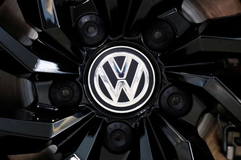 The logo of German carmaker Volkswagen is seen on a rim cap in a showroom of a Volkswagen car dealer in Brussels