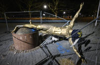 The damaged statue of soccer player Zlatan Ibrahimovic next to Stadion football arena in Malmo, Sweden, Sunday Jan. 5, 2020. Ibrahimovic, who recently joined Italian side AC Milan, angered fans of his boyhood club, Malmo, in November when he bought a stake in one of Swedish title rivals, Hammarby, and outlined his desire to make the Stockholm-based team “the best in Scandinavia". (Johan Nilsson/TT via AP)