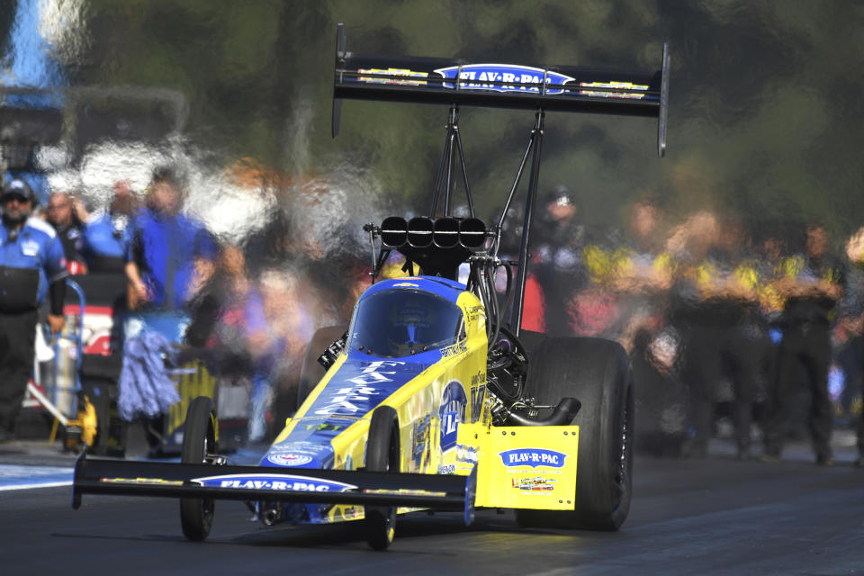 In this photo provided by the NHRA, Brittany Force drives in Top Fuel qualifying Saturday, July 30, 2022, at the Flav-R-Pac NHRA Northwest Nationals drag races at Pacific Raceways in Kent, Wash. (Marc Gewertz/NHRA via AP)