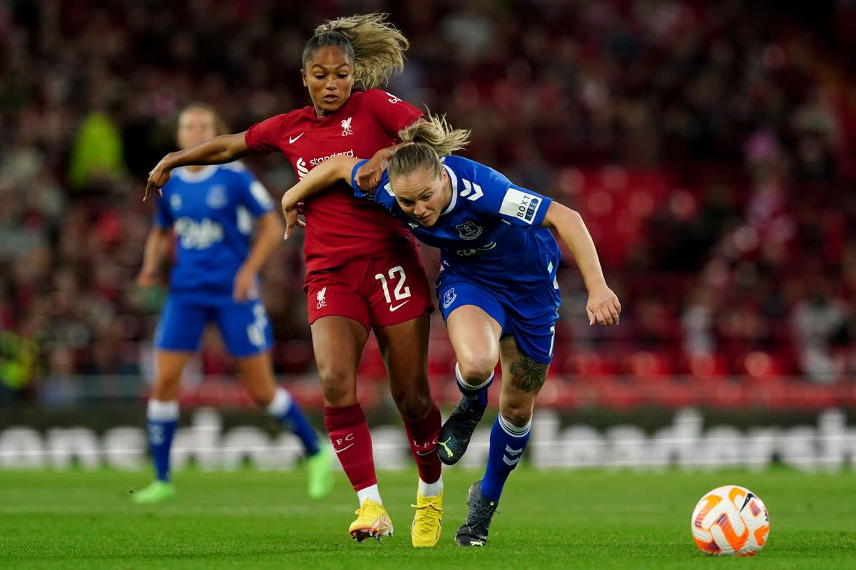 Liverpool’s Taylor Hinds battles with Everton’s Lucy Graham during last September’s match at Anfield (Martin Rickett/PA) (PA Wire)