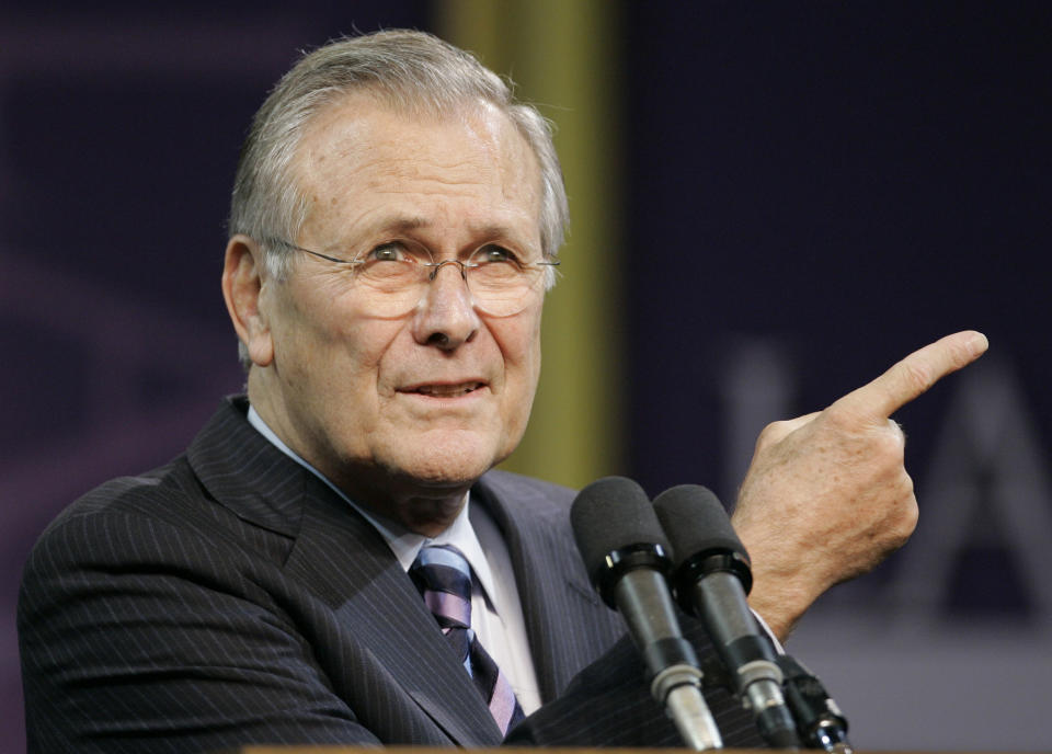 FILE - In this Nov. 9, 2006, file photo, Defense Secretary Donald Rumsfeld asks for another question following his Landon Lecture at Kansas State University in Manhattan, Kan. The family of Rumsfeld says he died Tuesday, June 29, 2021. He was 88. (AP Photo/Orlin Wagner)
