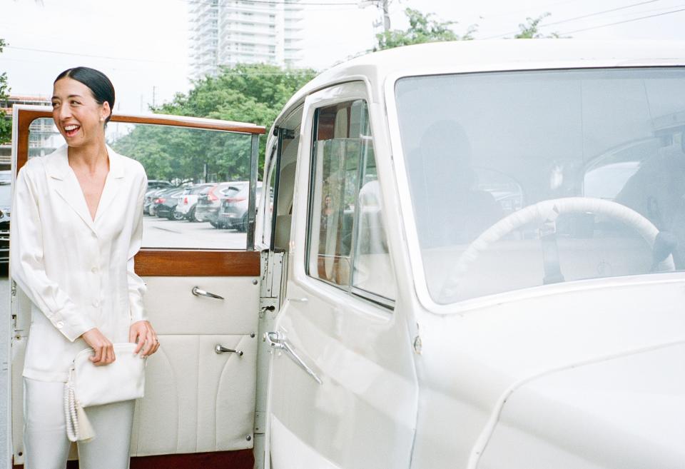 One of our dear friends surprised Michael and I with a vintage Rolls-Royce to take us to and from the wedding. It matched my silk white pajamas that I picked up on a work trip to Rome over the summer, and The Row clutch was truly the perfect accessory throughout my entire weekend.