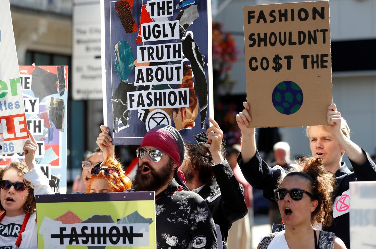 Extinction Rebellion protestors demonstrate against London Fashion Week in Westminster: REUTERS