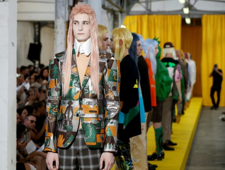 Models present creations by Walter Van Beirendonck during the Men's Fashion Week for the Spring and Summer 2018 collection in Paris, on June 21, 2017