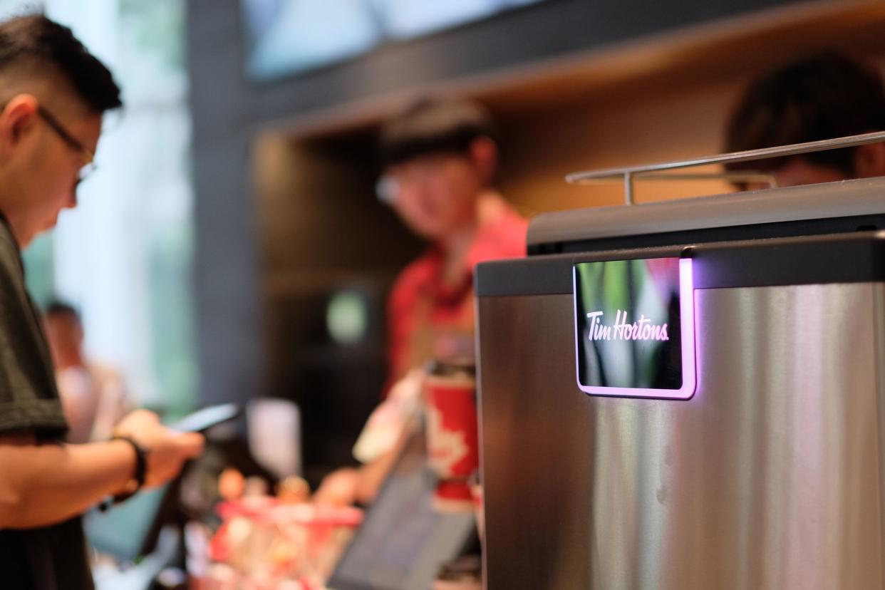 Interior of Tim Hortons, Shanghai, Coffee Machine Is Selective Focus