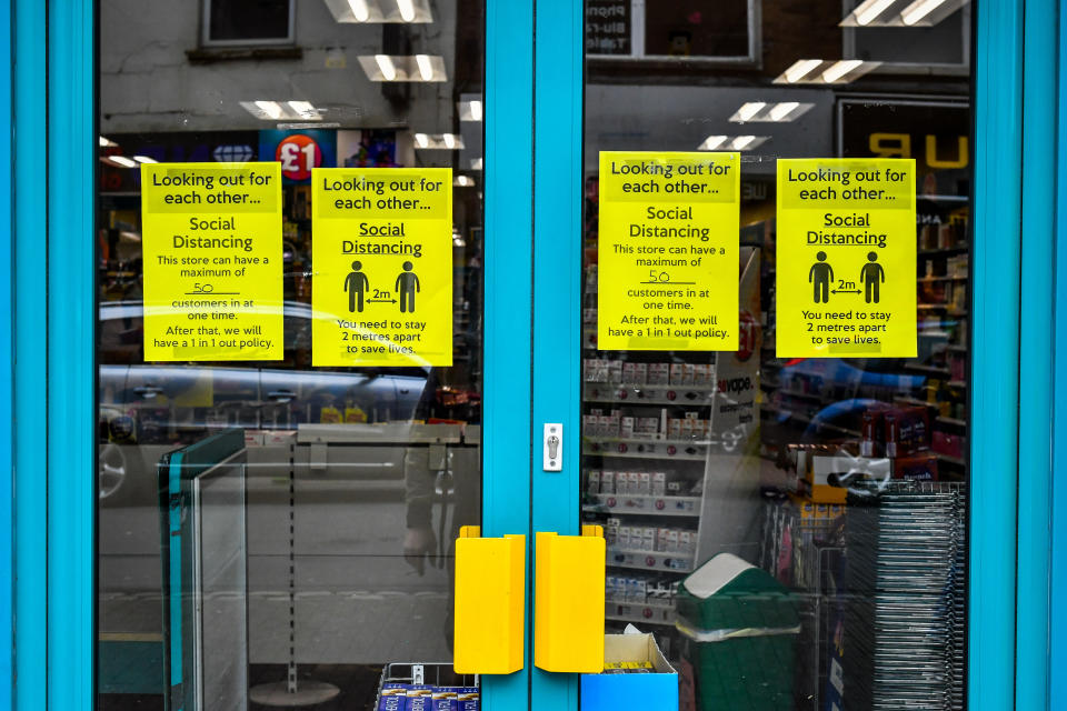 A coronavirus notice in a shop doorway in Bristol as the UK continues in lockdown to help curb the spread of the coronavirus.